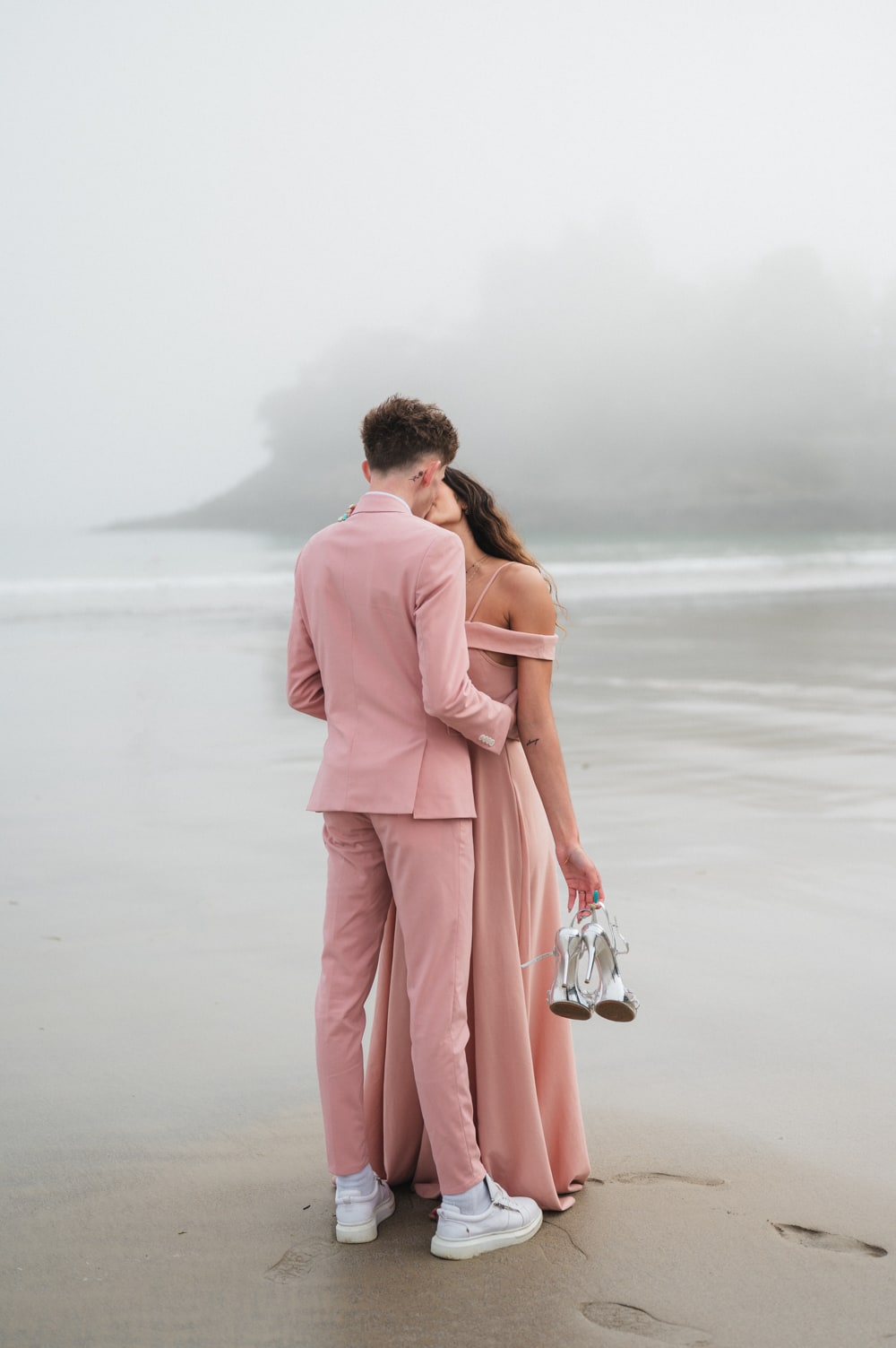 Photographe couple séance photo sur la plage